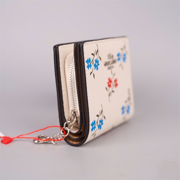 Ví Coach trắng hoa nhí gập 2 +