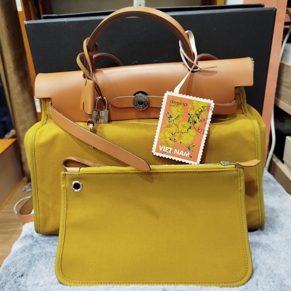 Túi Hermes vải vàng kèm pound , charm KG+