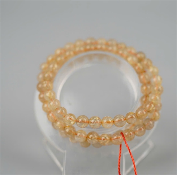 Chuỗi thạch anh tóc vàng KG+
