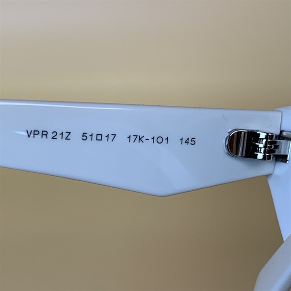 Kính Prada gọng trắng sữa KG+