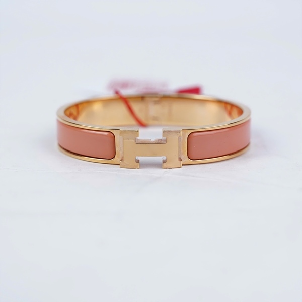 Vòng tay Hermes hồng cam stampQ szPM +