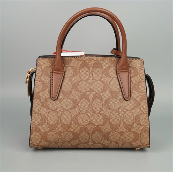 Túi Coach handle nâu sz21 +