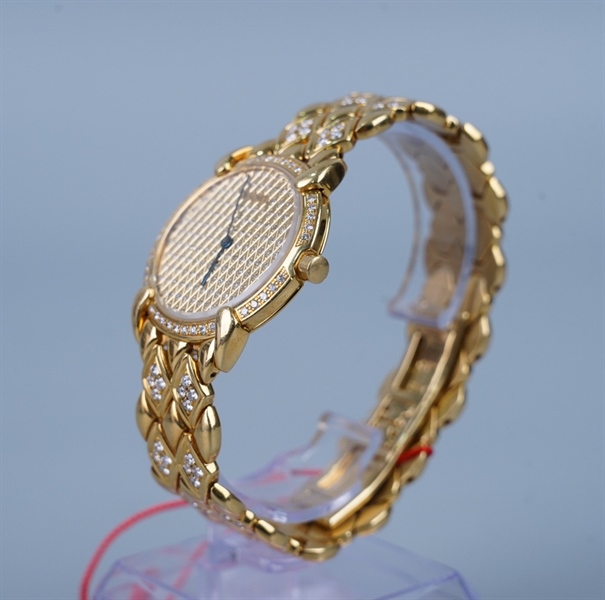 Đồng hồ Chaumet mặt tròn dây vàng KG+
