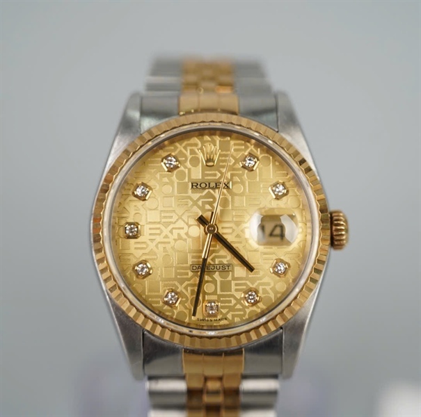 Đồng hồ Rolex mặt tròn viền vàng dây bạc sz36 (HC) KG+