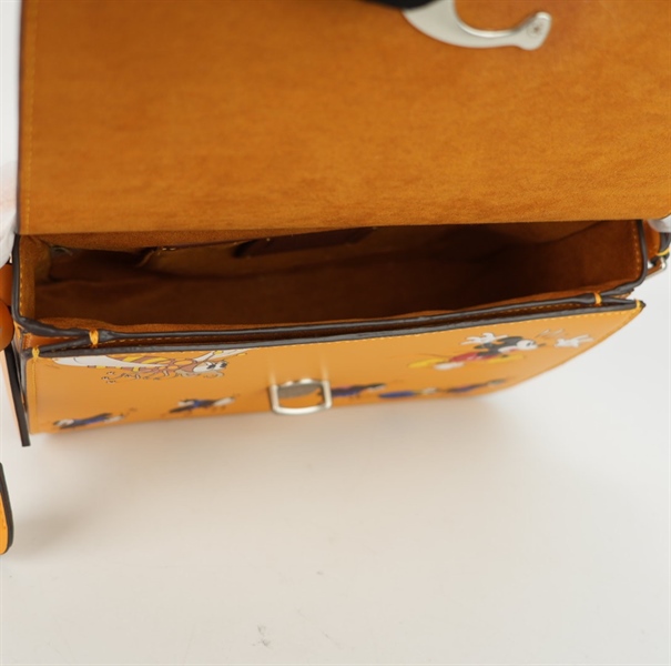 Túi Coach Disney màu vàng kèm chìa sz25 +