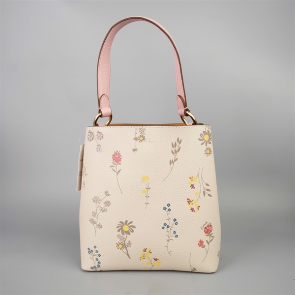 Túi Coach Bucket trắng in hoa sz20 +