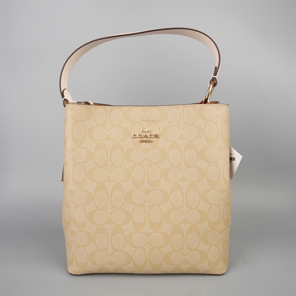 Túi Coach Bucket nude in chữ sz24 +