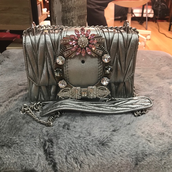 Túi Miu miu xám bạc đính đá +