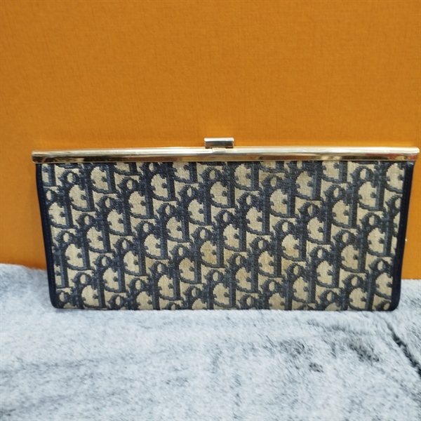 Túi Clutch Dior kẹp vàng KG+