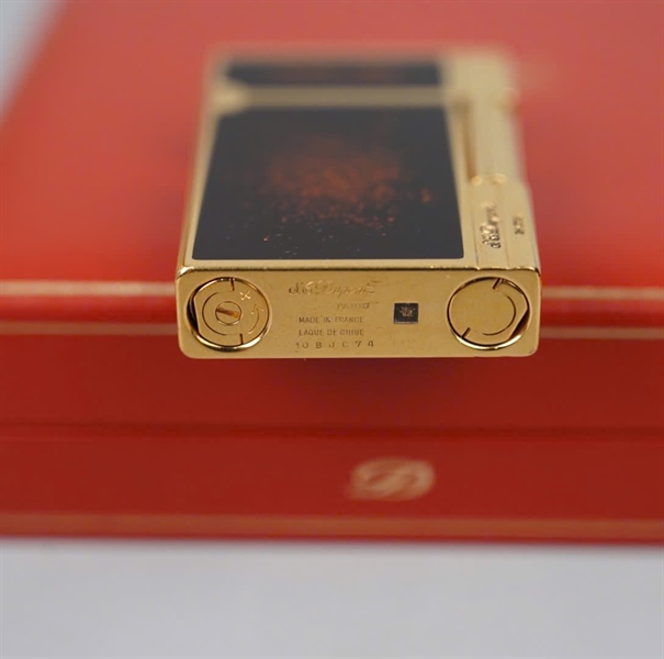 Bật lửa S.T Dupont vàng đen ánh sao (10BJC71) KG+