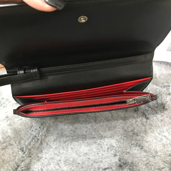 Túi Christian Louboutin đen gắn đinh +