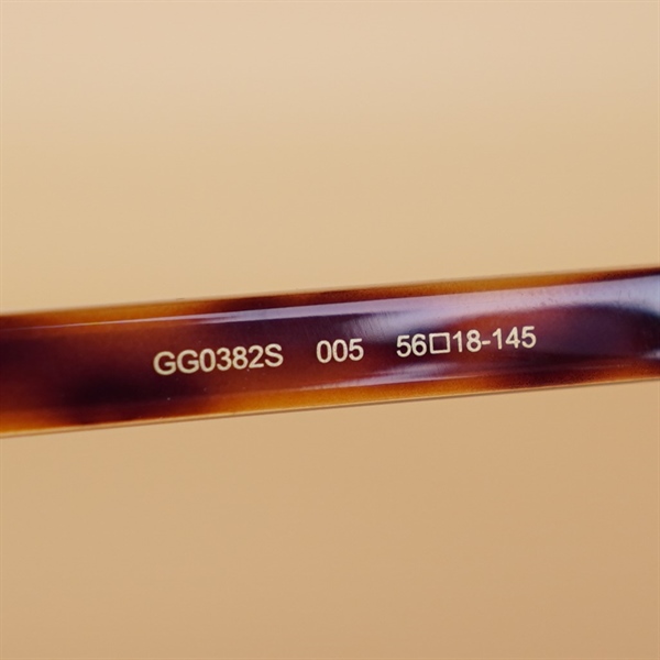 Kính đen GG gọng nâu đỏ KG+