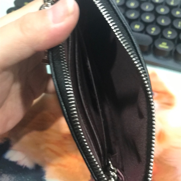 Móc ví Chanel đen +