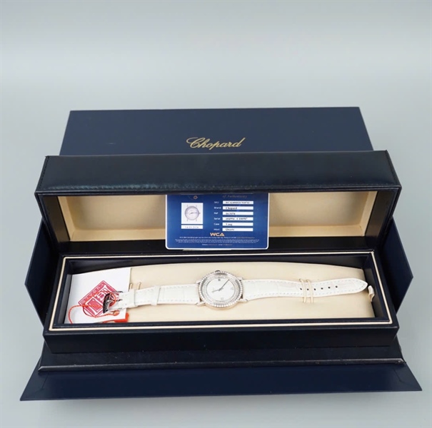 Đồng hồ Chopard mặt tròn quai trắng (163154) sz34 KG+