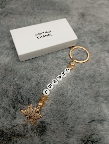Móc khóa hạt Chanel KG+