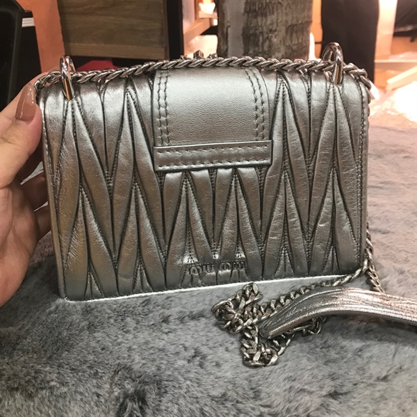 Túi Miu miu xám bạc đính đá +