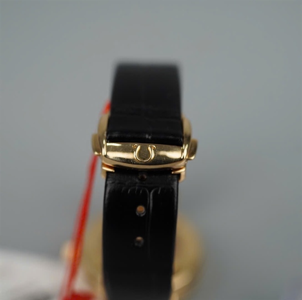 Đồng hồ Omega mặt tròn đen viền vàng (98000117) (HC) KG+